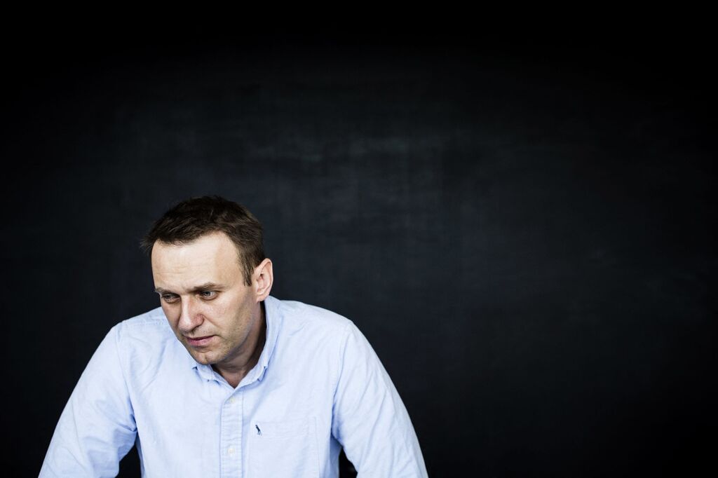 Alexei Navalny sitting at a desk in his office in Moscow on July 7, 2017